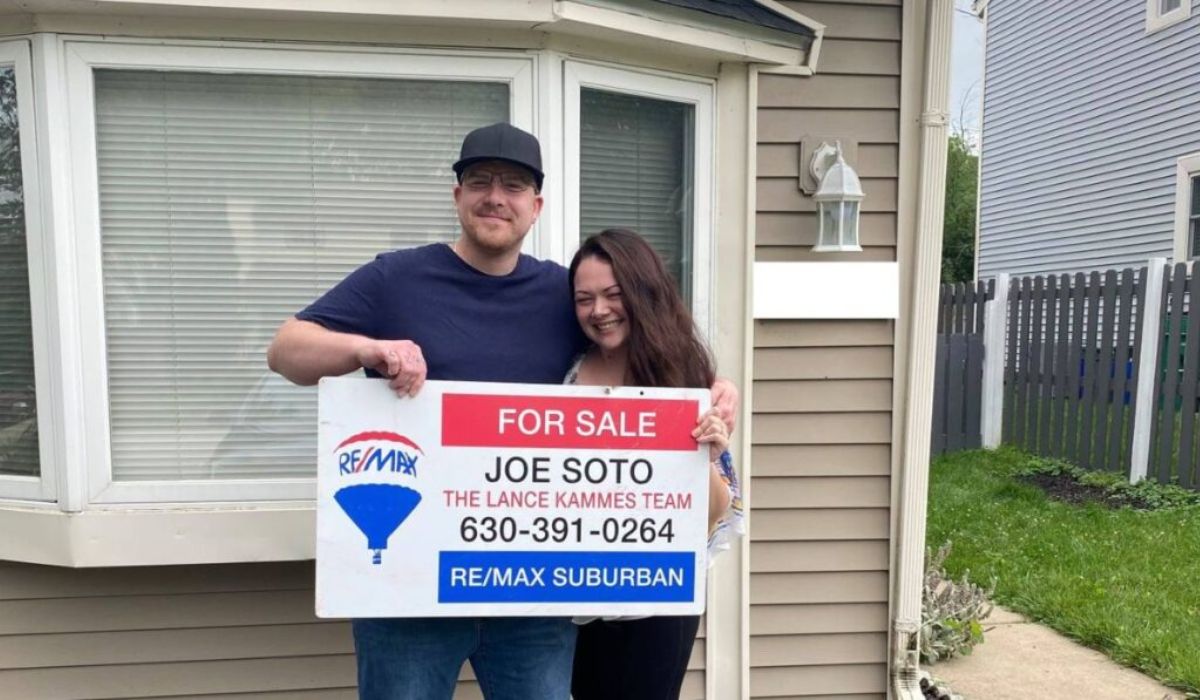A couple was holding a Joe Soto promotional sign for sale